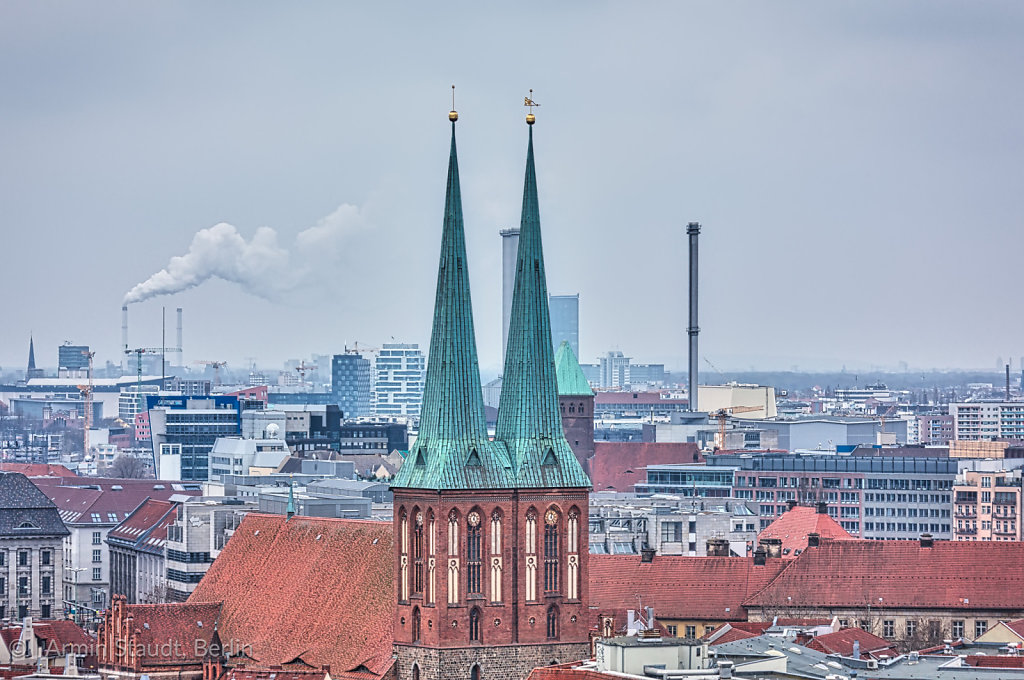 panorama fo Berlin with church and industry