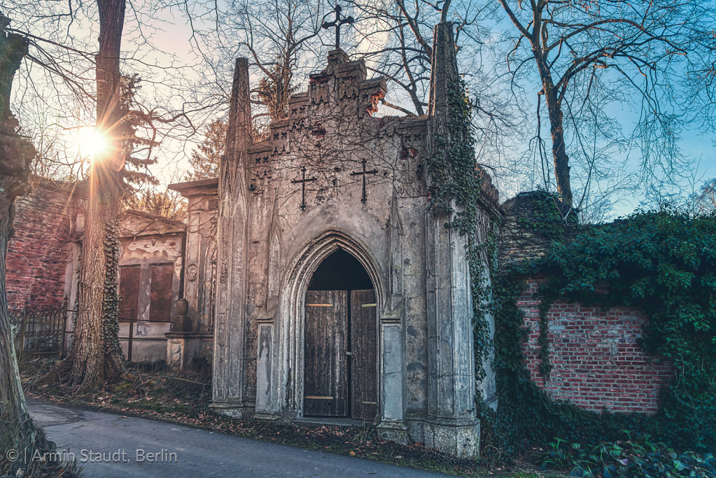 old tomb in gothic style with evening sun